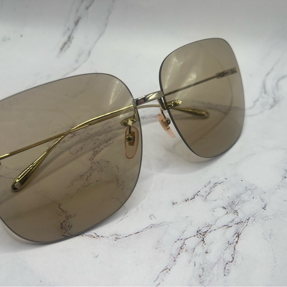 Gucci Sunglasses
GG1148S 003
Gold-Gold-Brown
Gucci sun soft padded case green main image 8